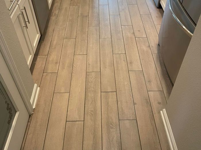 a hardwood floor in a kitchen super 168极速赛车预测网最新结果记录 -赛车开奖结果体彩 Cleanand smooth after Zerorez cleaned it
