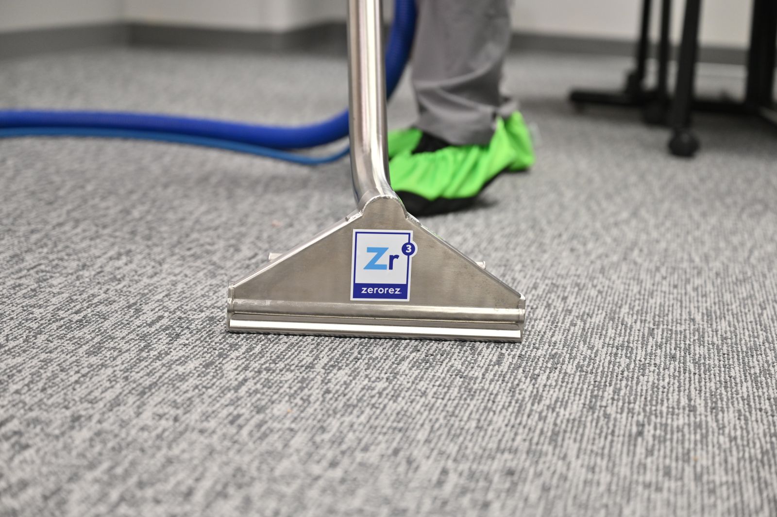 Zerorez&reg; Zr Wand extracting and cleaning Berber carpets in a commercial office building